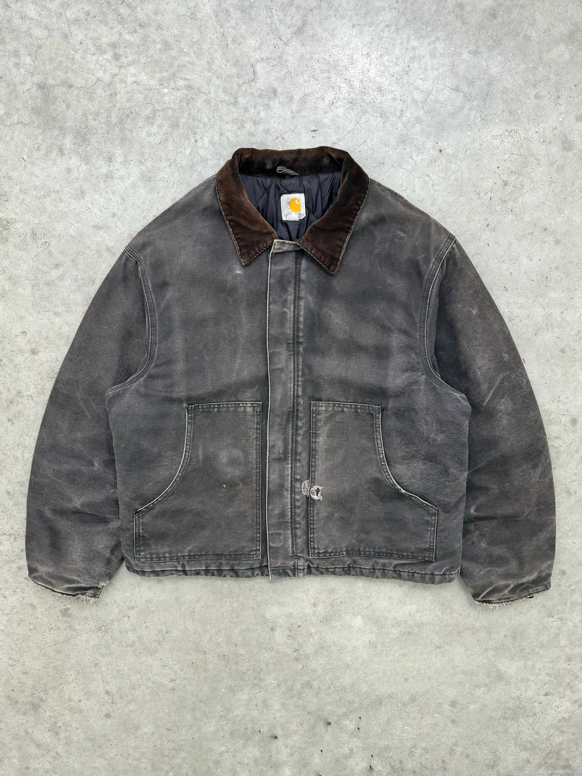 FADED BLACK AND DISTRESSED CARHARTT JACKET - 1990S