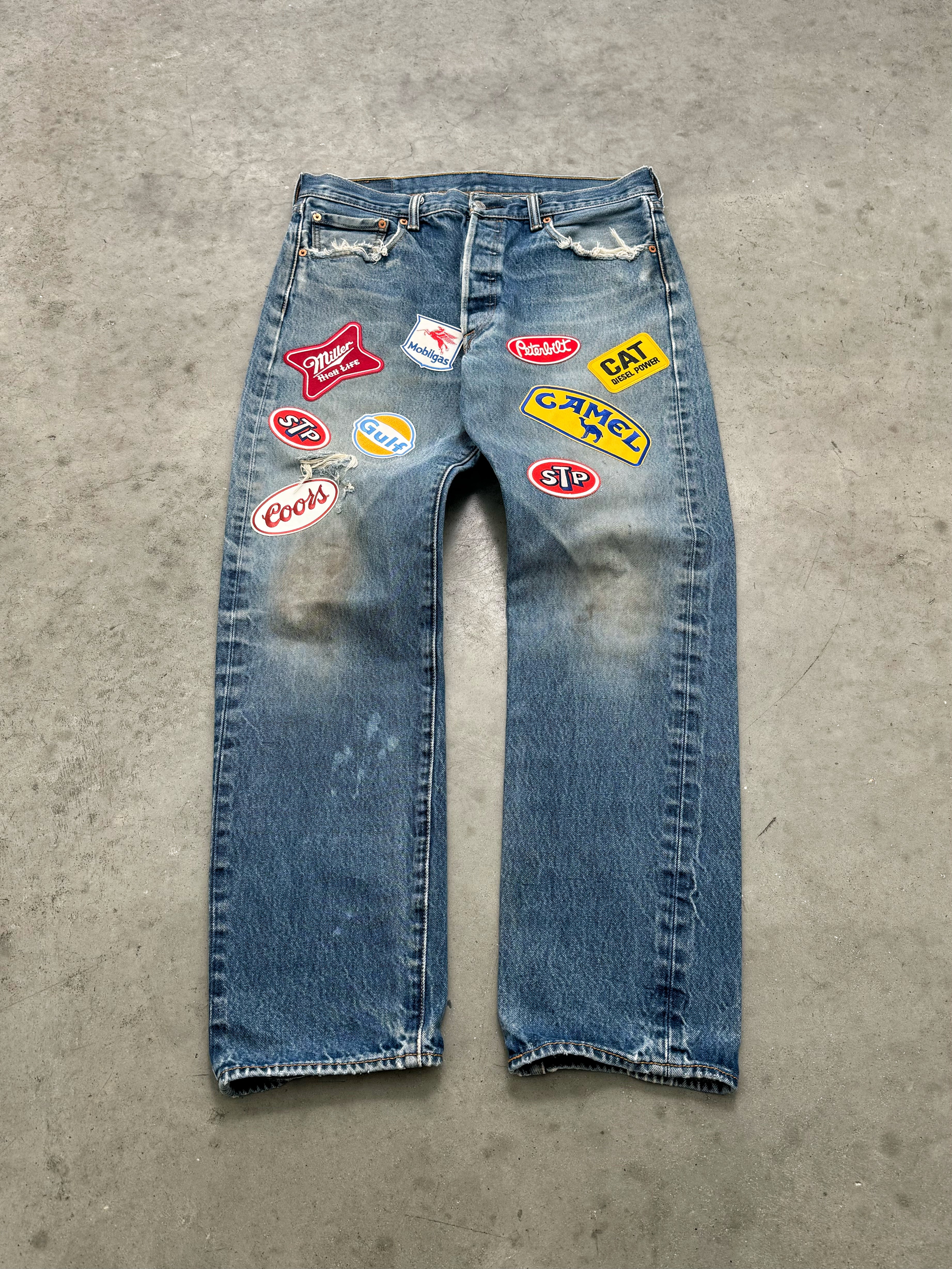 DISTRESSED & FADED BLUE LEVIS PATCHWORK JEANS - 2000S