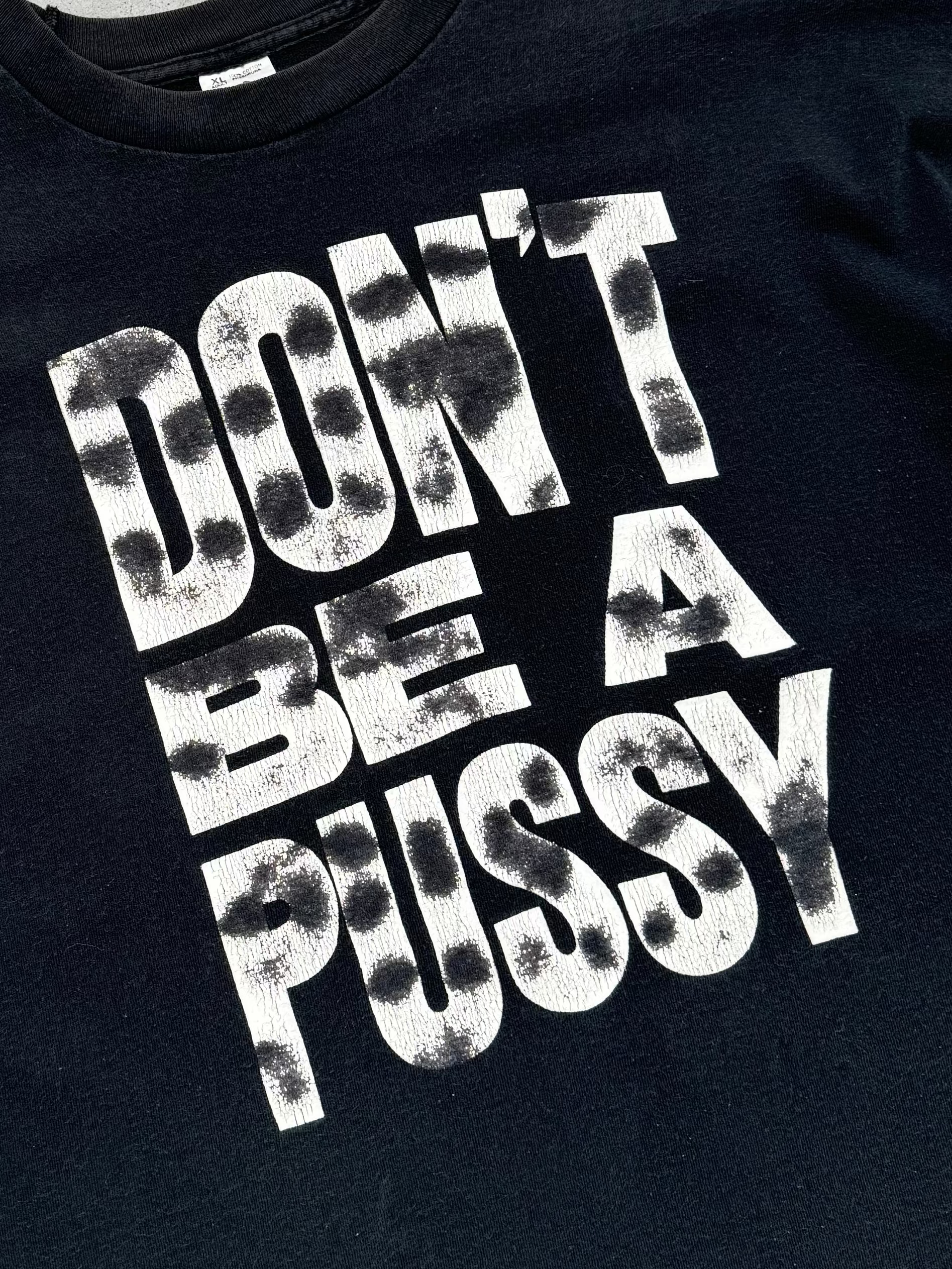 “DON'T BE A PUSSY” FADED BLACK TEE - 1990S