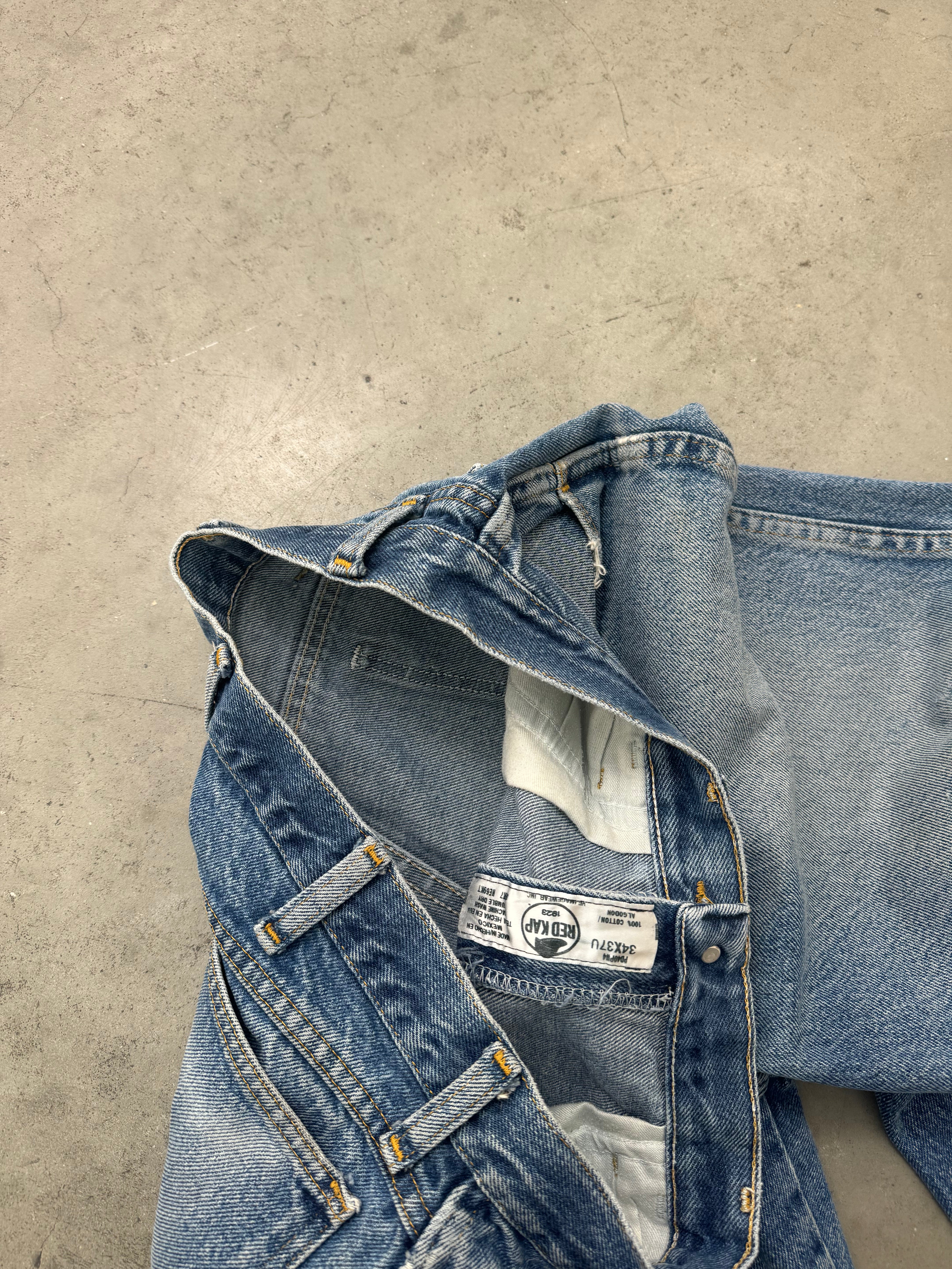 DISTRESSED & FADED BLUE OPEN HEM JEANS - 1990S