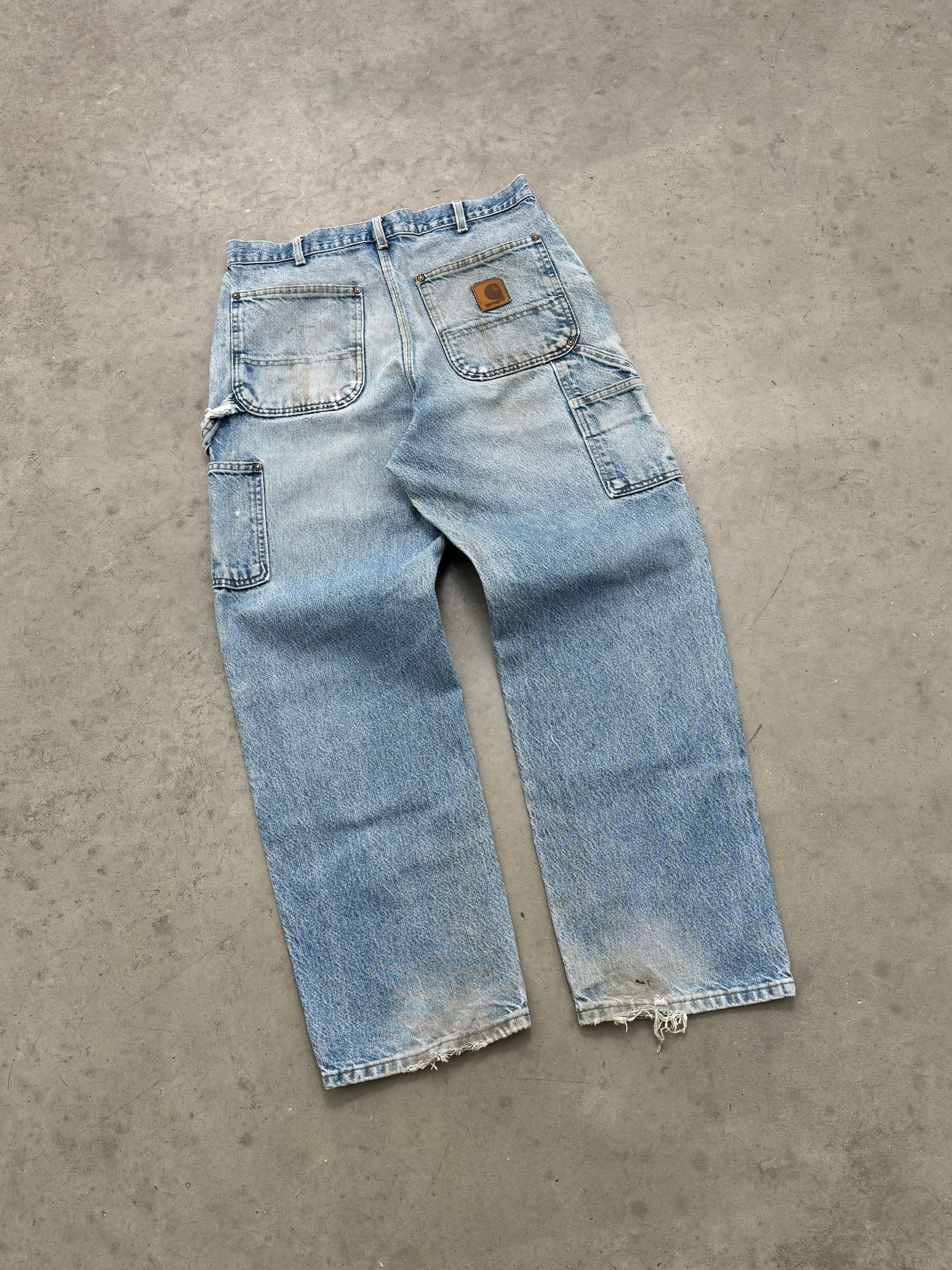 FADED AND DISTRESSED CARHARTT DOUBLE KNEE JEANS - 1990S