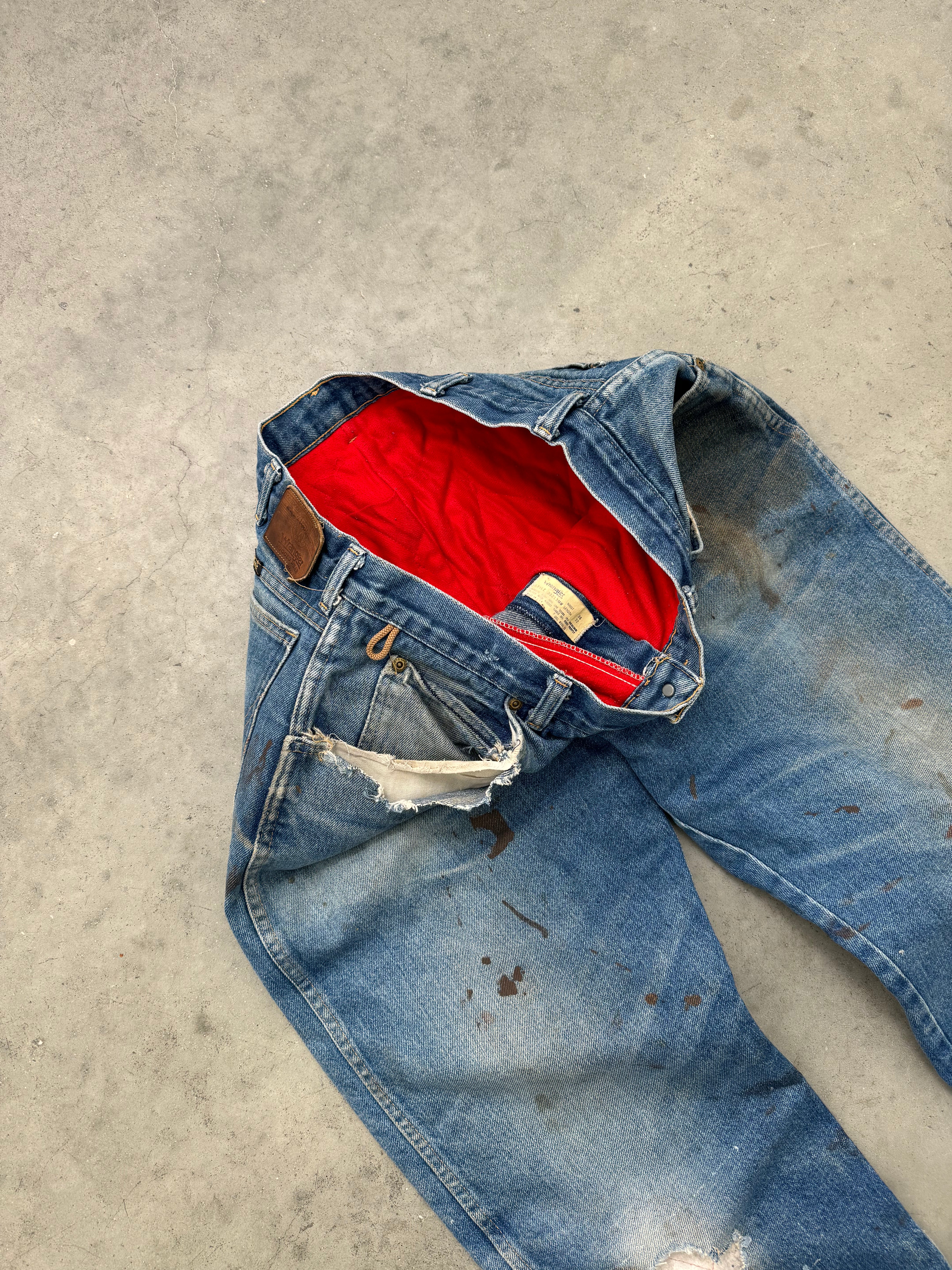 FADED & DISTRESSED RED FLANNEL LINED WRANGLER DENIM - 1980S