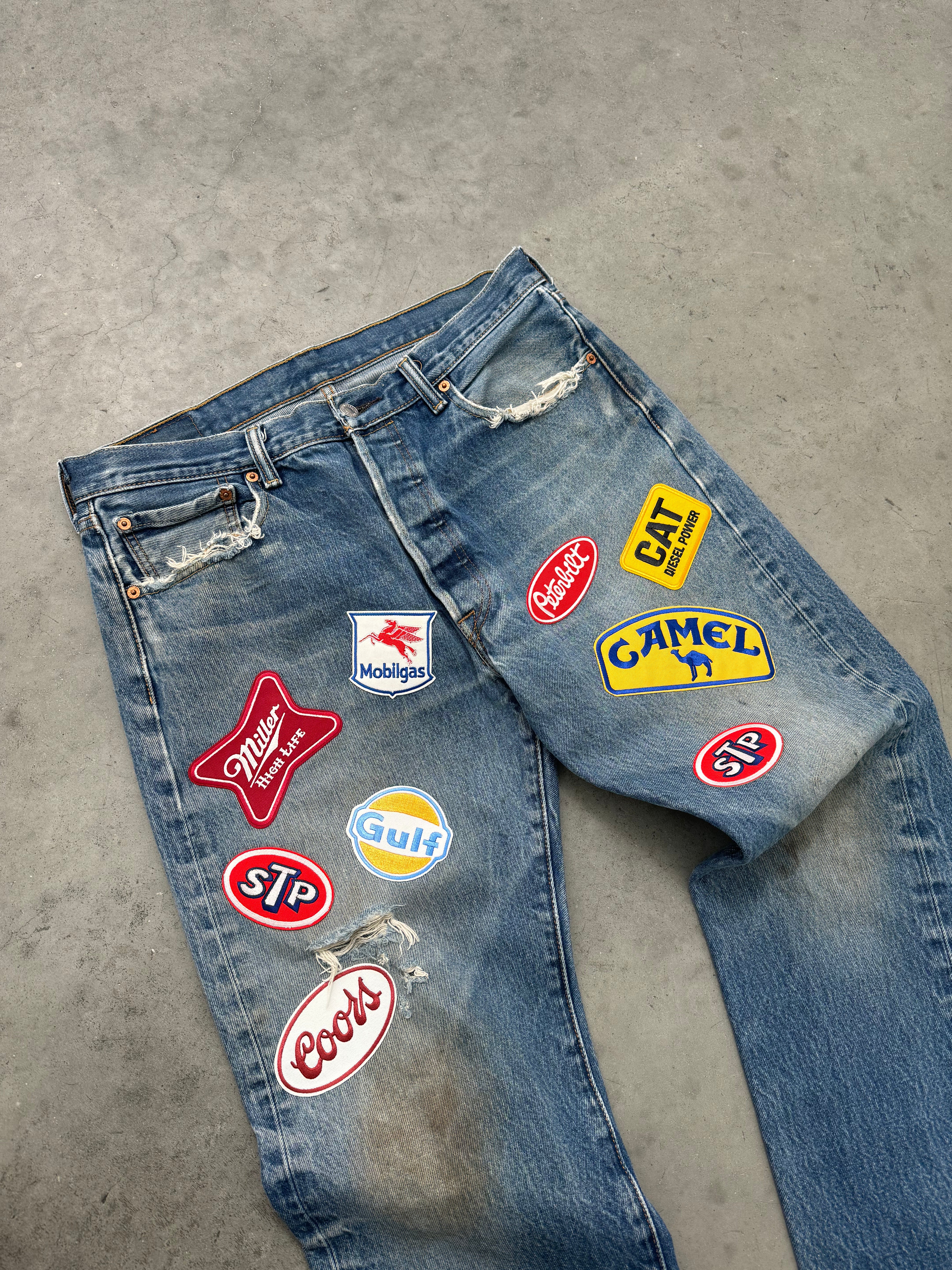 DISTRESSED & FADED BLUE LEVIS PATCHWORK JEANS - 2000S