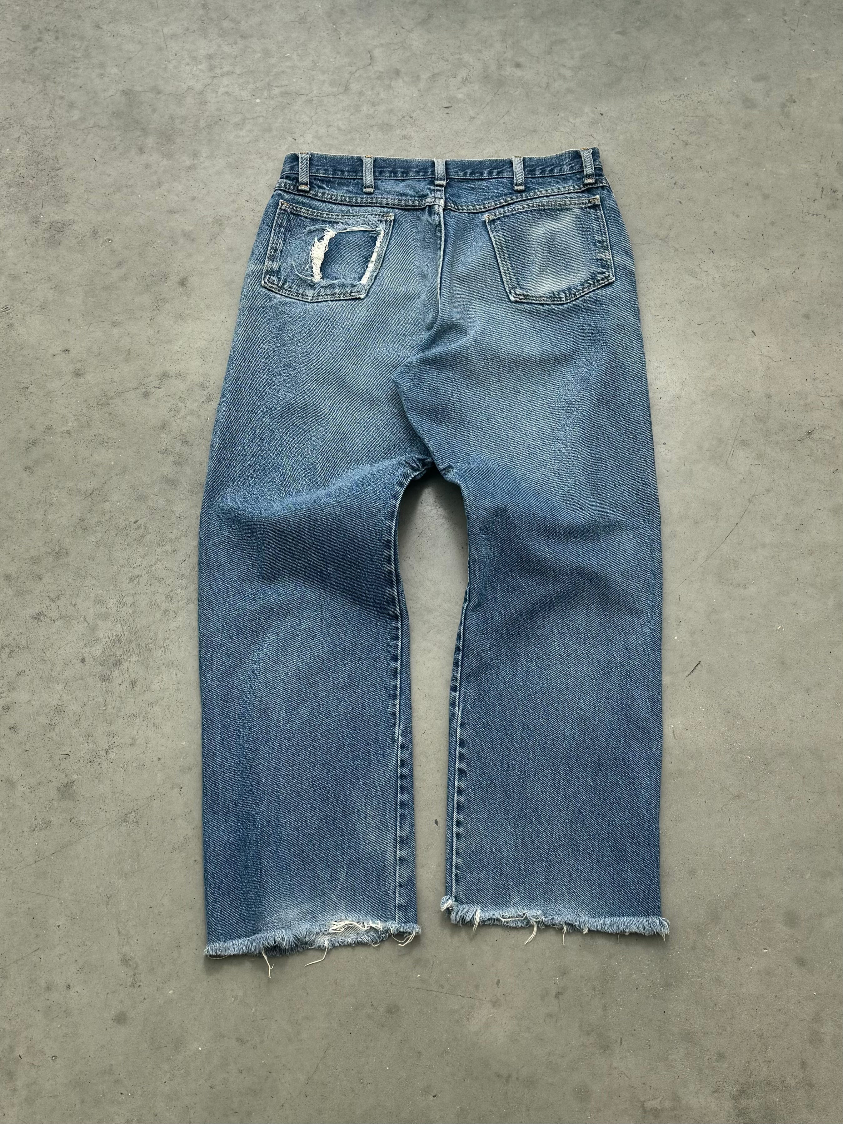 DISTRESSED & FADED BLUE OPEN HEM JEANS - 1990S