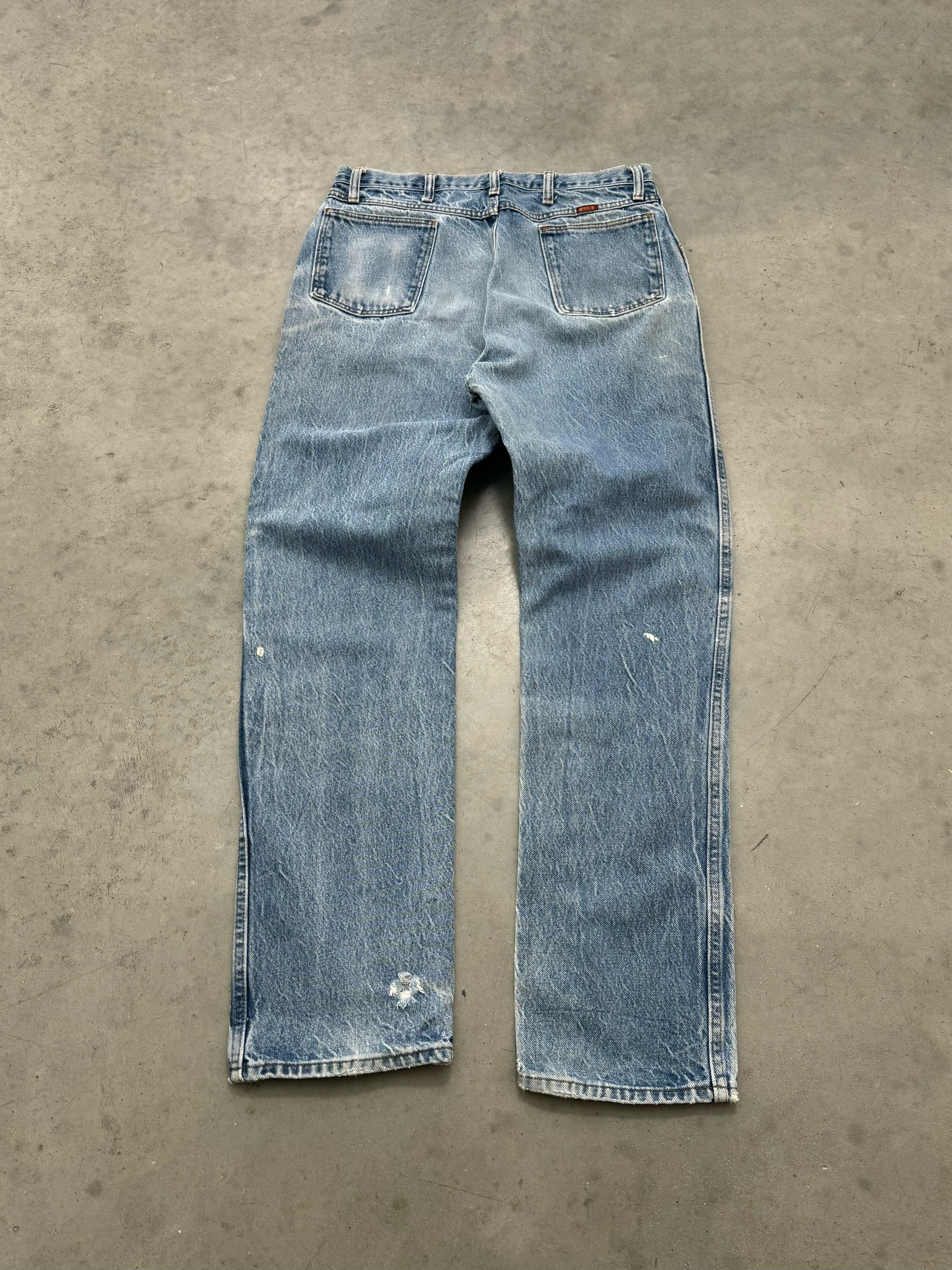 PAINT SPLATTER & FADED BLUE JEANS - 1990S