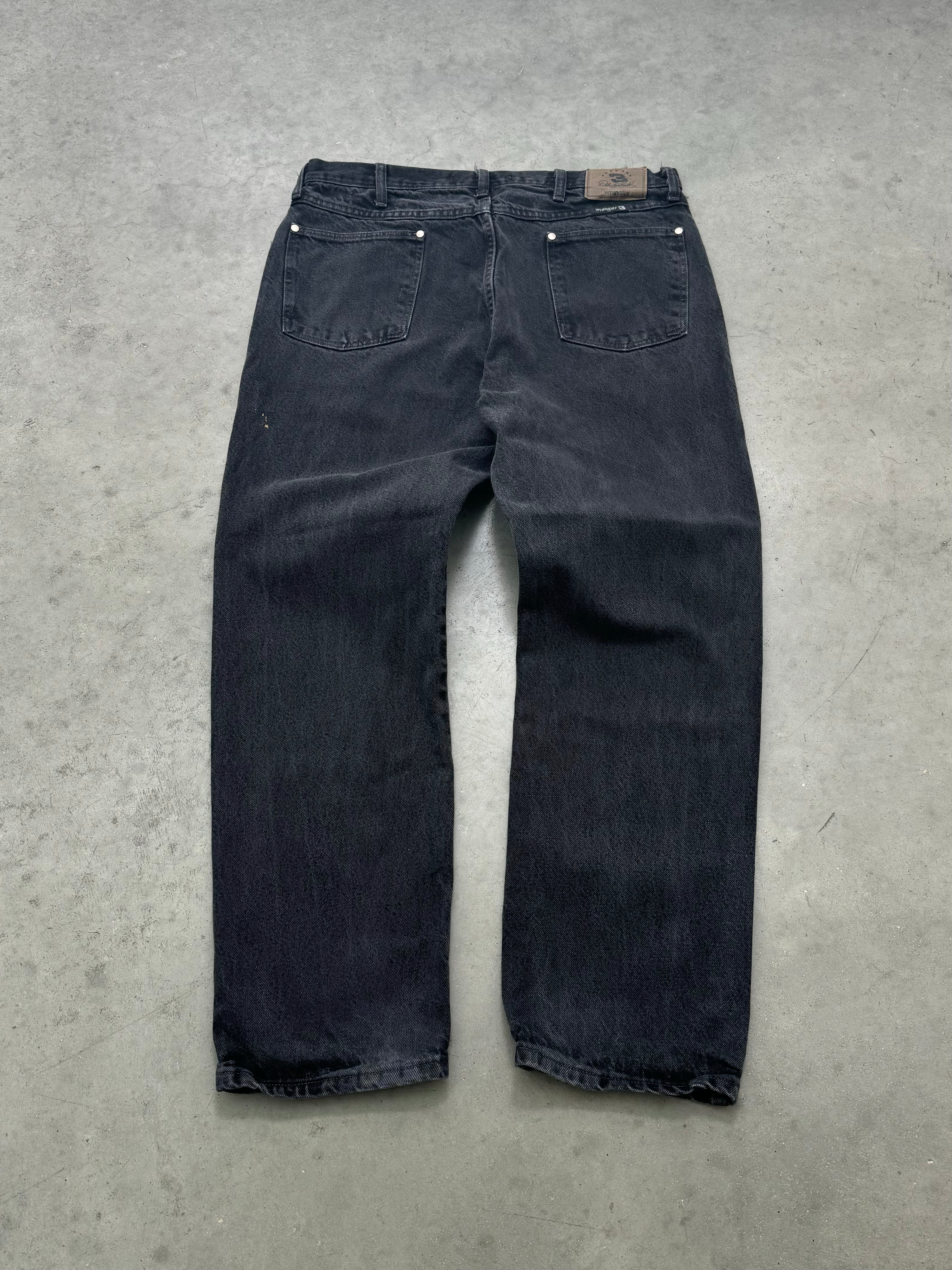FADED BLACK WRANGLER DALE EARNHARDT JEANS - 2000S